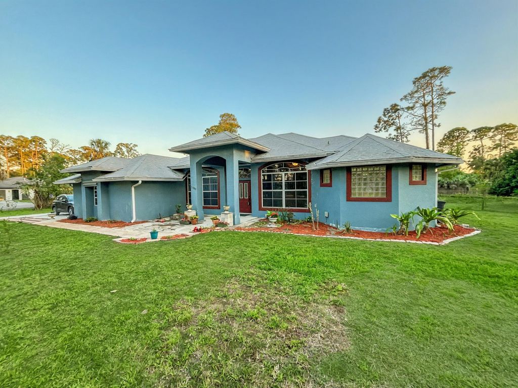 Photo of 15808 89th Place N, The Acreage, FL 33470 (MLS # R11164729)