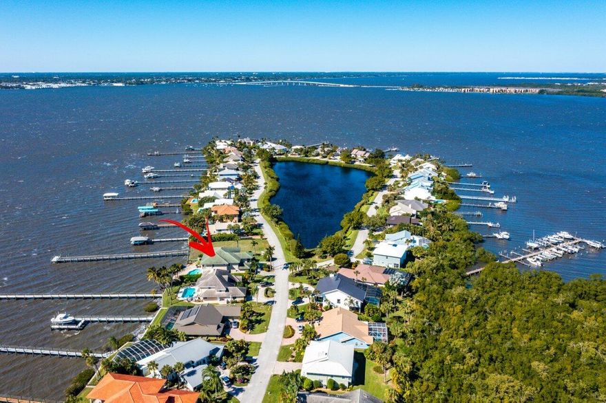 LIVE YOUR BEST LIFE AT JOES POINT! This is a true Atlantic to intracoastal community with all the amenities you could ask for. This Waterfront, Hutchinson Island home boasts 6 Bedrooms and 7 Bathrooms. Located in the Exclusive Neighborhood of Joe's Point with its own Private Beach Access. Enjoy endless boat days, only 12 minutes to the inlet, a deeded dock with lift in the community marina transfers with the sale. Yes, you can add your own private dock in the backyard for more dock space. Enjoy additional water activities from your own backyard; Kayak, Paddleboard, Fish, Jet Ski on the wide open Intracoastal.  Cherish the Sunsets in the yard or watch the Sunrise at Joe's Point private beach.  This is a rare chance to own one of the newer,CBS larger homes in Joe's Point with over 5,300sq ft
