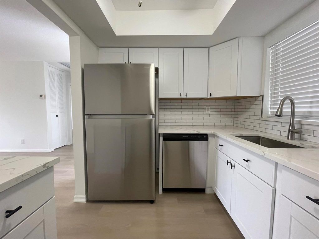 Photo of 2561 Barkley Drive W #B, West Palm Beach, FL 33415 (MLS # R10965047)