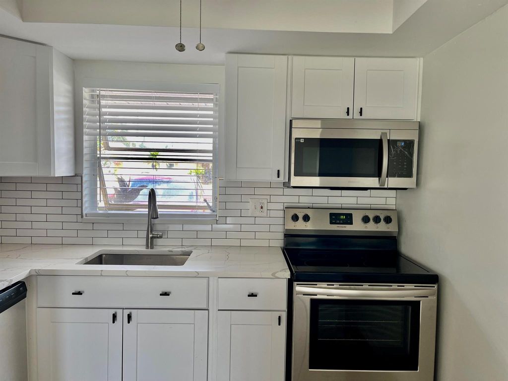 Photo of 2561 Barkley Drive W #B, West Palm Beach, FL 33415 (MLS # R10965047)