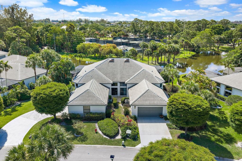 Photo of 1106 Sand Drift Way #A, West Palm Beach, FL 33411 (MLS # B26021152)