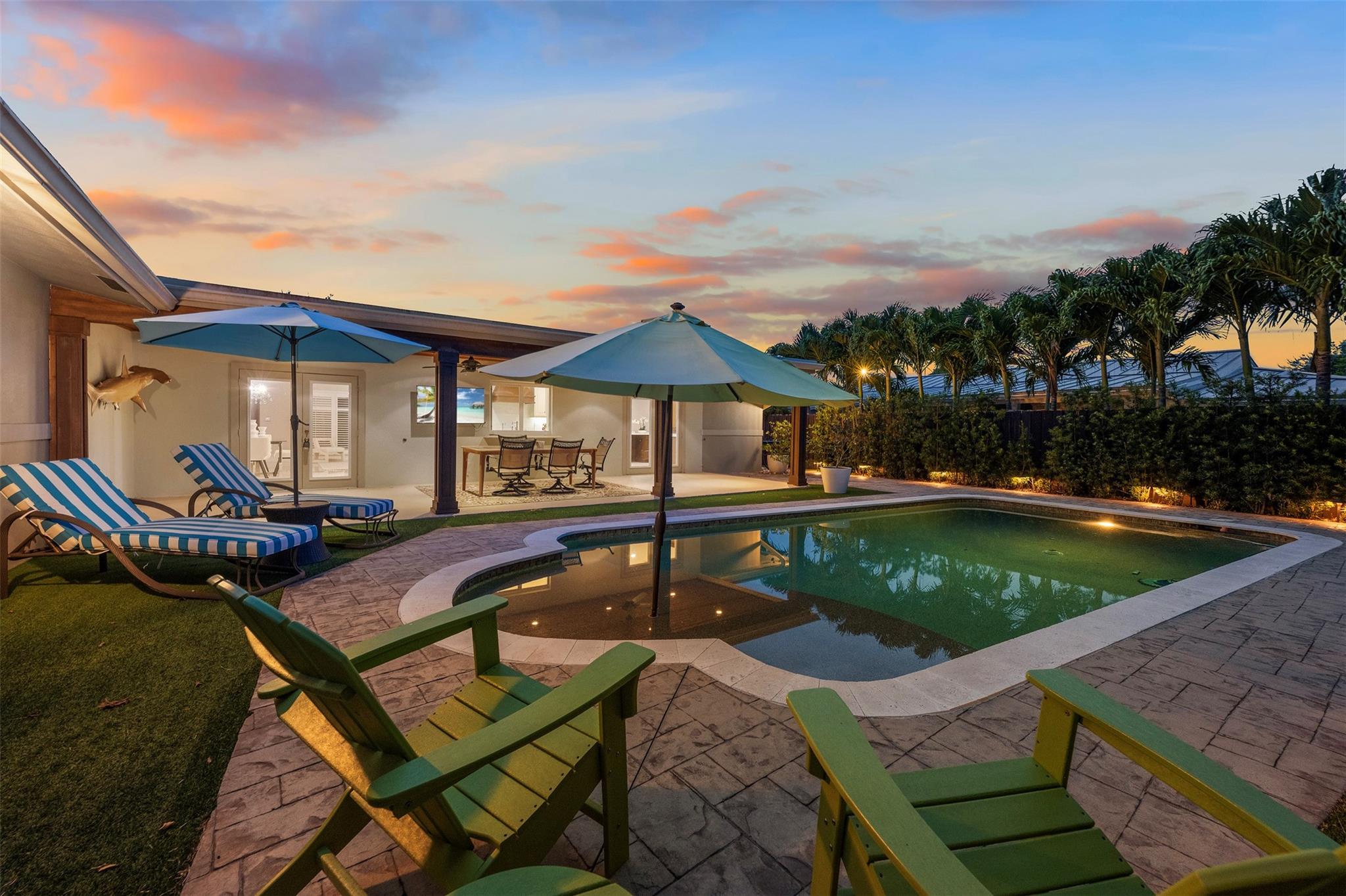 The finest home to hit the market in Coral Ridge Isles, this beautifully updated home offers two spacious living rooms and a top-of-the-line chef’s kitchen. Highlights include a 48” Sub-Zero refrigerator, dual dishwashers (Miele and Fisher & Paykel drawer), a KitchenAid microwave/oven combo, and an induction cooktop. The entertainer’s bar opens to the expansive family room and pool area, creating the perfect flow for hosting. Recent capital improvements include all-new PVC plumbing (2024), newer AC system and ducts (2022), upgraded electrical, and a newly refinished PebbleTec pool surface. Ideally located minutes from top-rated public and private schools, including Floranada Elementary (A-rated), St. Mark’s, Pine Crest, and Westminster Academy. Easy access to I-95 makes commuting a breeze.