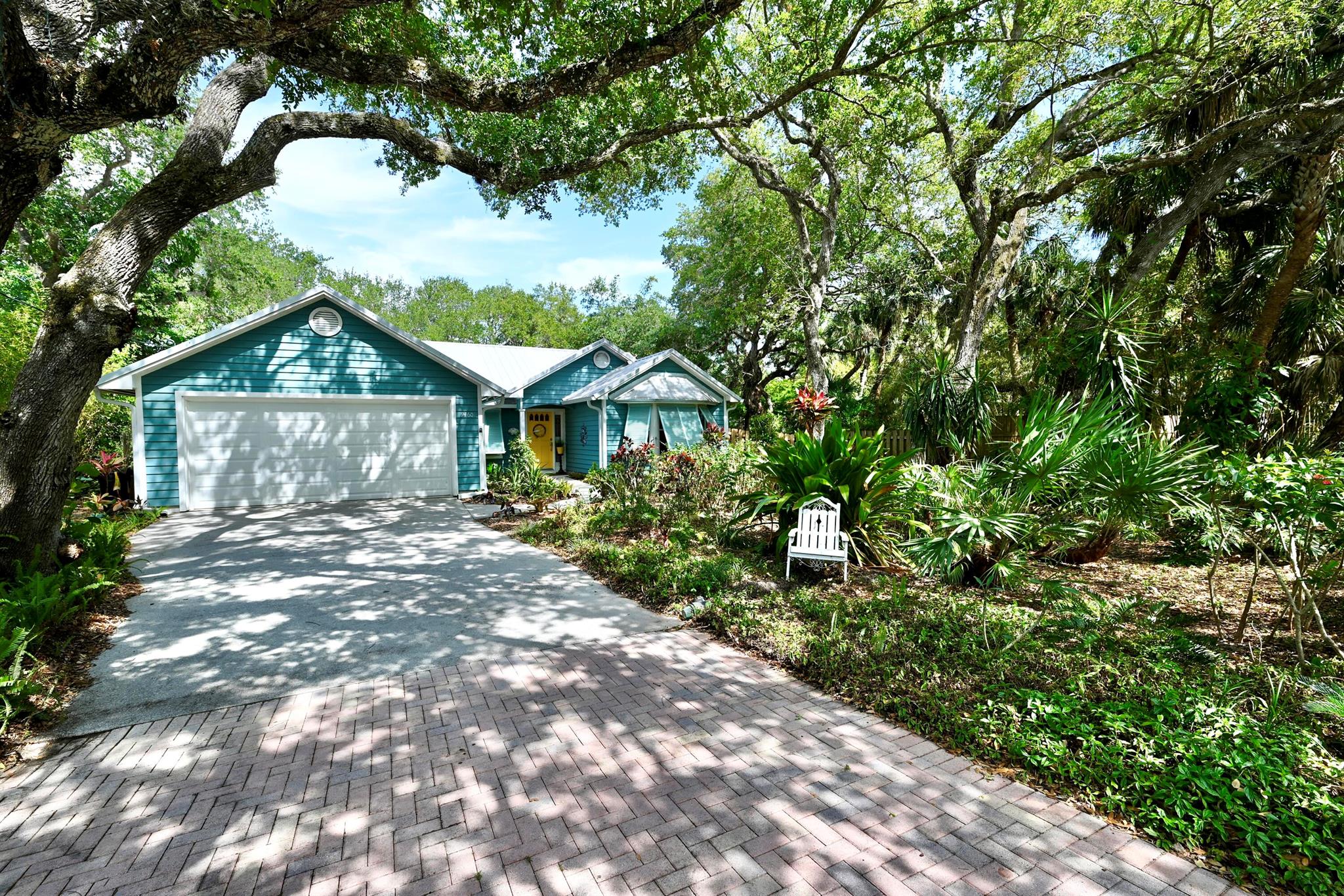 Stunning, tranquil & bucolic beach cottage, just a few minutes' walk to the ocean or the iconic Jungle Trail. Fully furnished, available in season & off-season. Seasonal rental - December - April $5500 per month. Off-seasonal rental - May - November $3500 per month. If rental is 6 months or longer tenant does not pay Tourist Development tax of 12% Landlord will deduct all utilities & any damage from security deposit. 3 bedrooms, 2 baths, living room, family room & 2 car garage. Detached building in back garden can serve as additional living space. Home can easily sleep 6. Pets considered on a case-by-case basis.