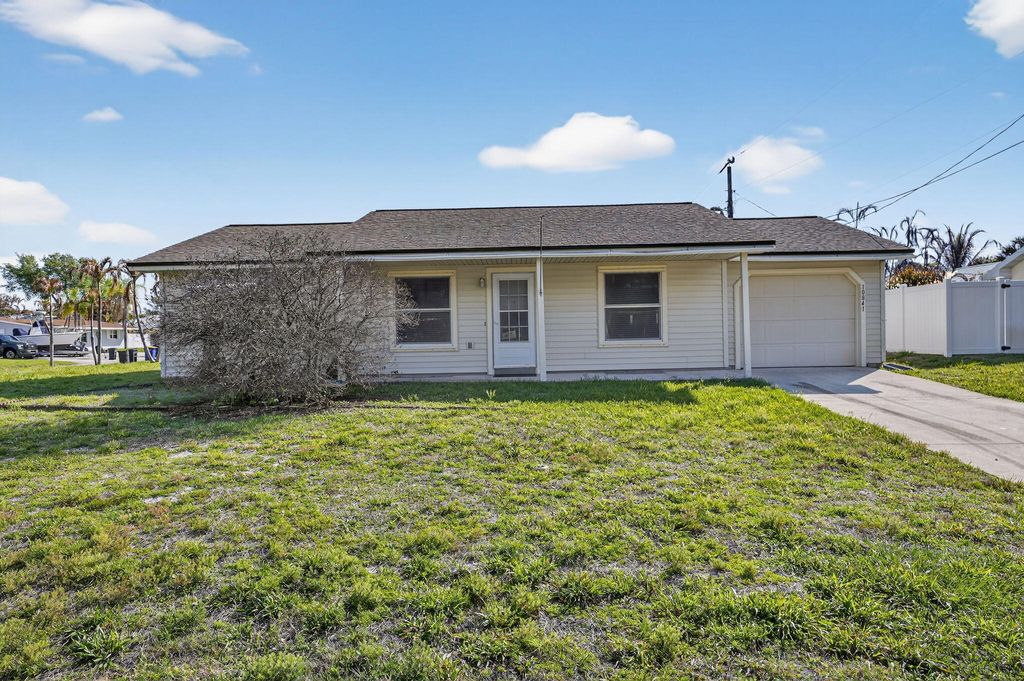 Photo of 10841 SE Fir Drive, Hobe Sound, FL 33455 (MLS # B26020068)