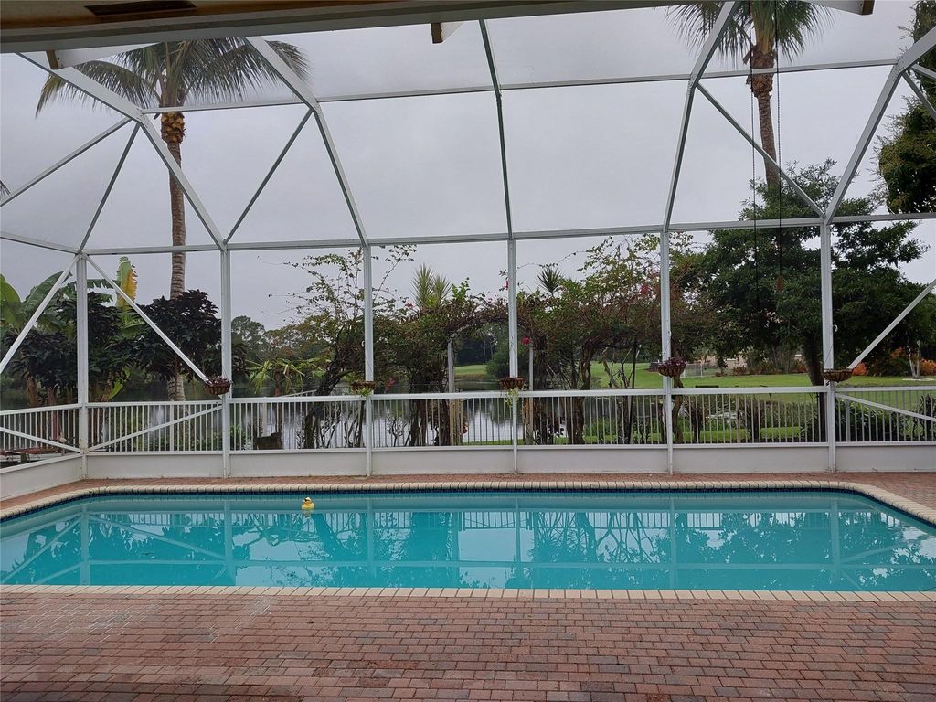 Photo of 7042 SE Bay Hill Dr, Stuart, FL 34997 (MLS # F10527417)