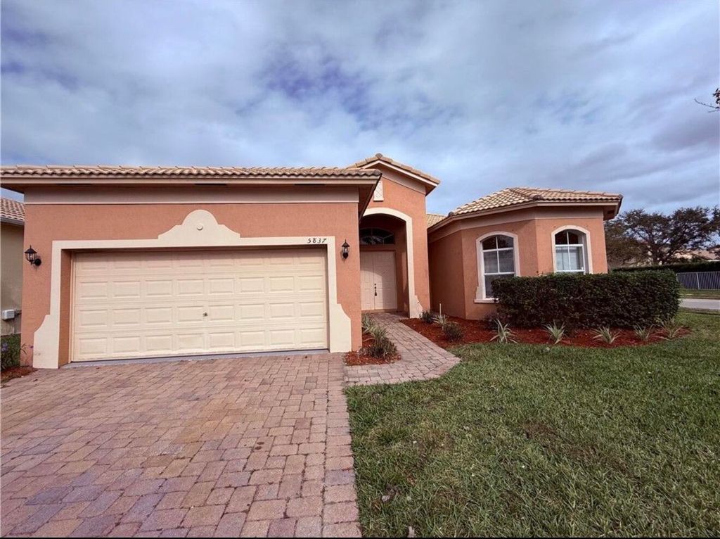 Photo of 5837 Spanish River Road, Fort Pierce, FL 34951 (MLS # B26032345)