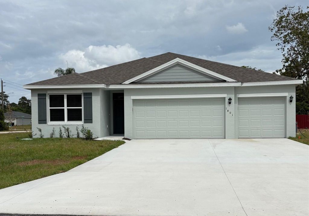 Photo of 1801 SW Bismarck Street, Port Saint Lucie, FL 34953 (MLS # R11051870)