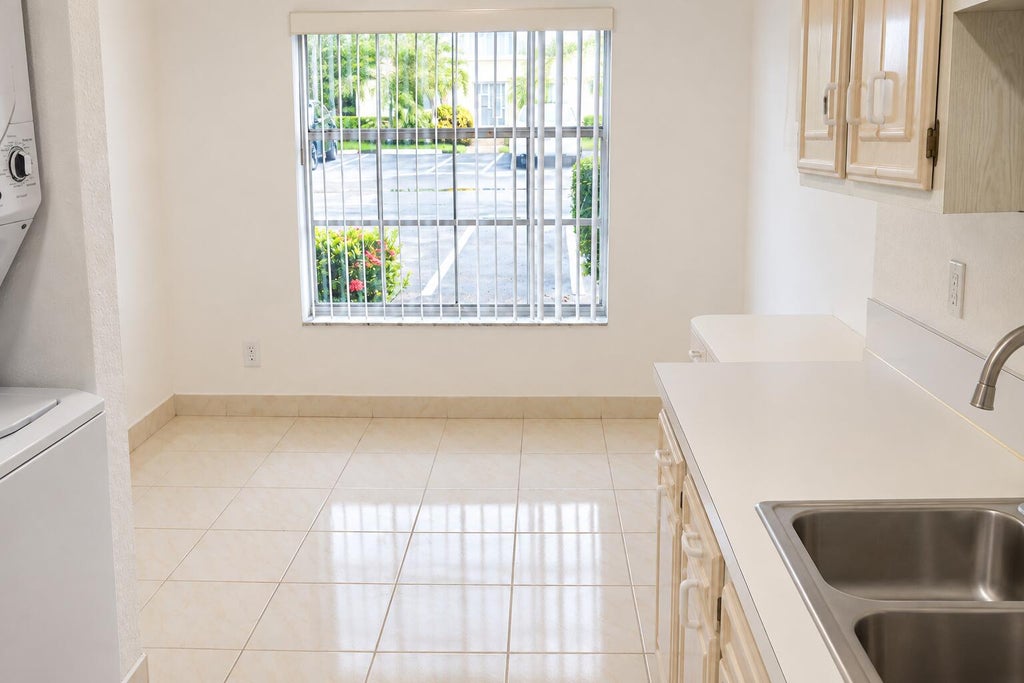 Photo of 13638 VIA FLORA #D, Delray Beach, FL 33484 (MLS # B26076123)