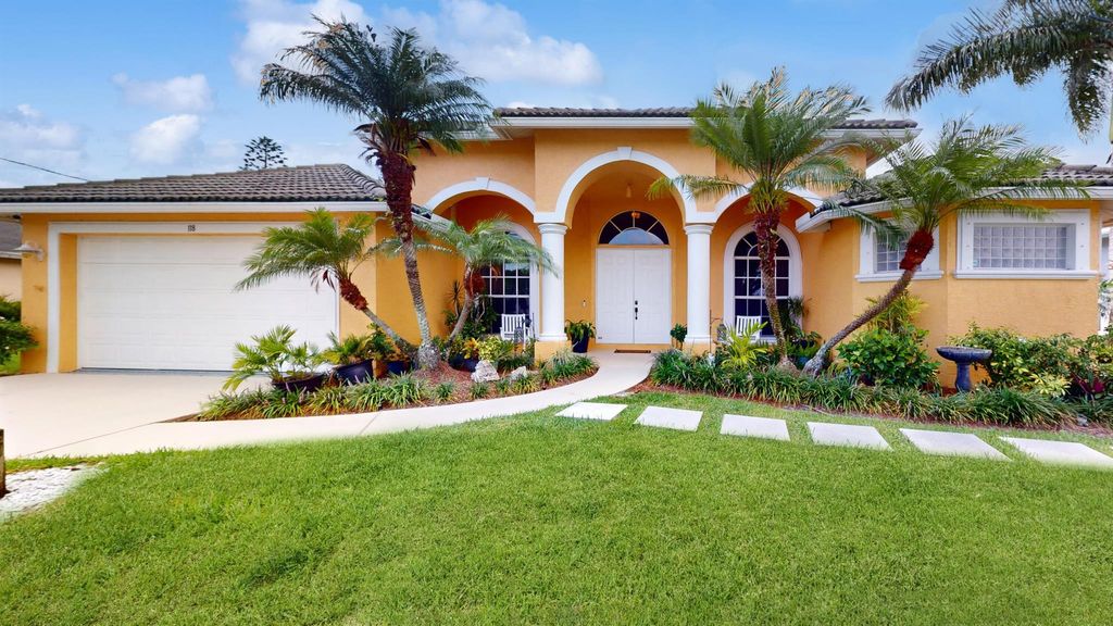 Photo of 118 NE Surfside Avenue, Port Saint Lucie, FL 34983 (MLS # R10997348)