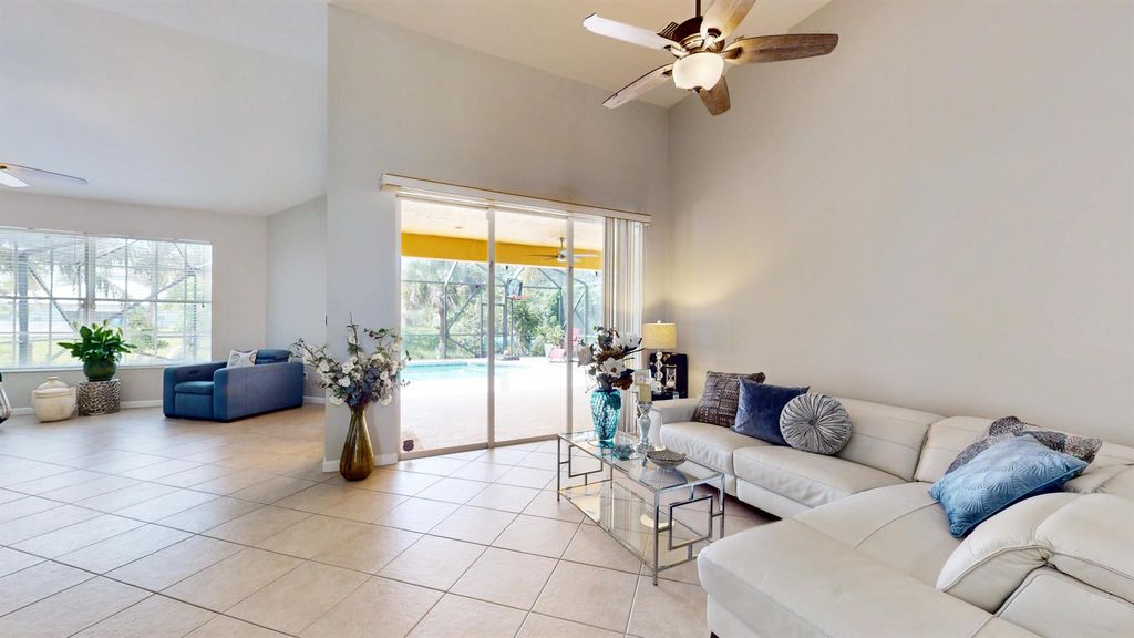 Photo of 118 NE Surfside Avenue, Port Saint Lucie, FL 34983 (MLS # R10997348)