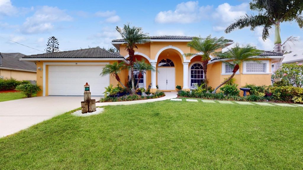 Photo of 118 NE Surfside Avenue, Port Saint Lucie, FL 34983 (MLS # R10997348)