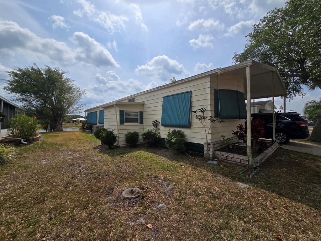 Photo of 7 Ecuador Way, Fort Pierce, FL 34951 (MLS # R10987636)