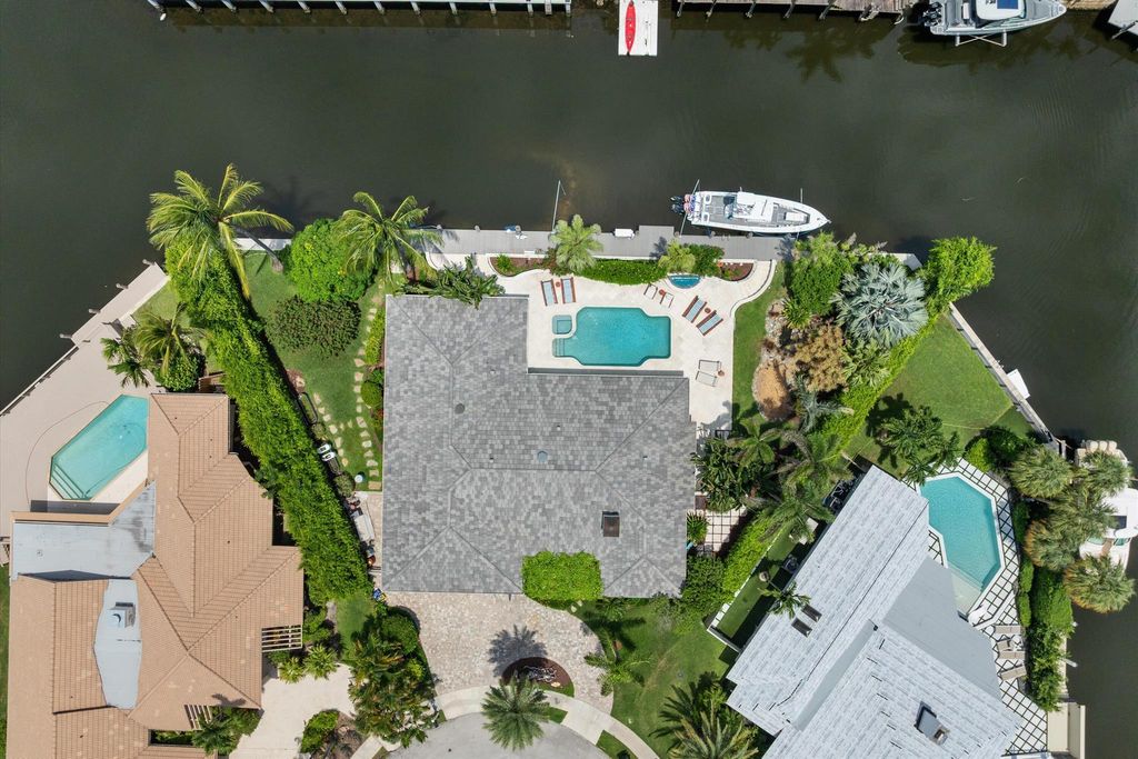 Photo of 830 NE Boca Bay Colony Drive, Boca Raton, FL 33487 (MLS # R11106965)