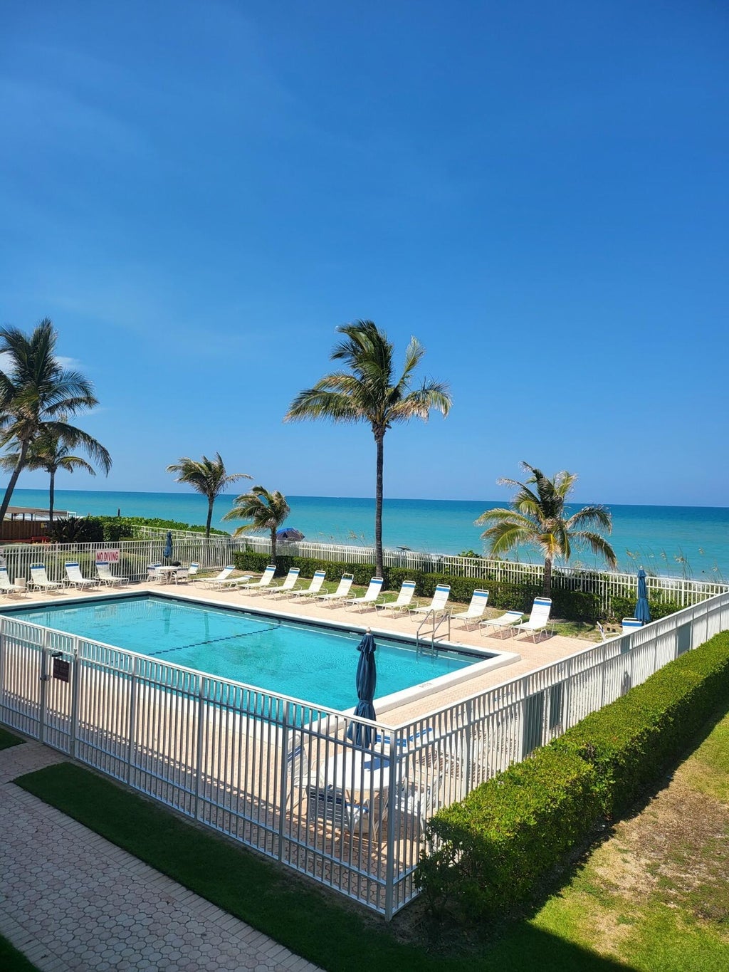 Photo of 9800 S Ocean Drive #214, Jensen Beach, FL 34957 (MLS # B26080924)