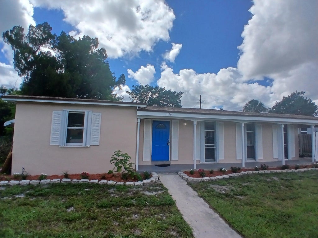 Photo of 216 NE Prima Vista Boulevard, Port Saint Lucie, FL 34983 (MLS # R11123780)