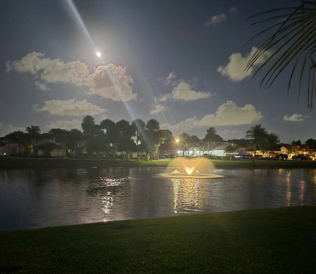 Photo of 12841 Oak Knoll Drive, Palm Beach Gardens, FL 33418 (MLS # R11164125)