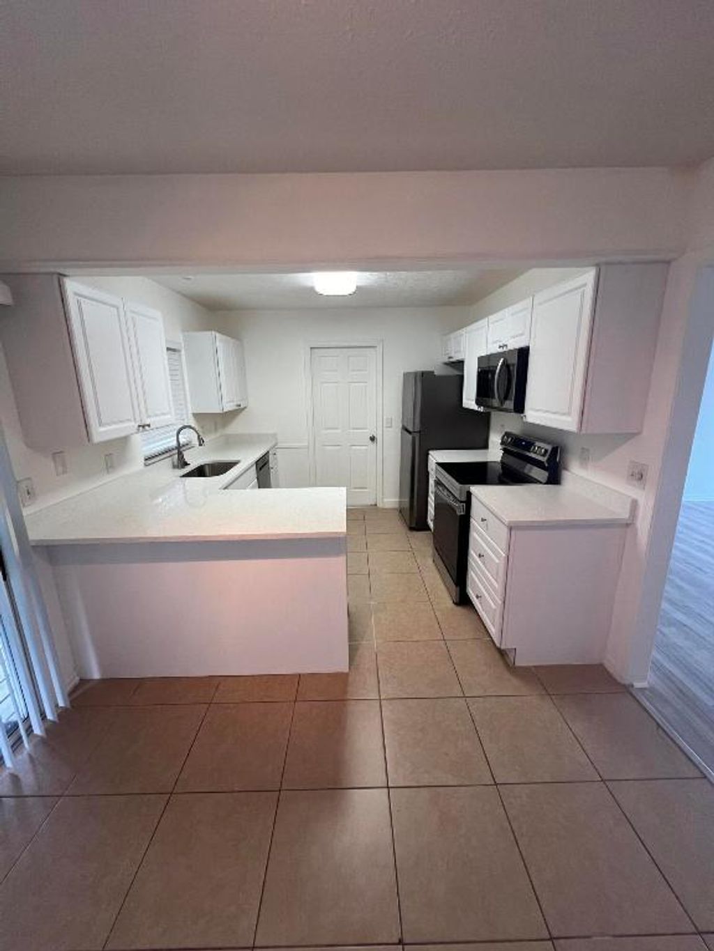 Photo of 2602 NE Myrtle Street, Jensen Beach, FL 34957 (MLS # R10956342)