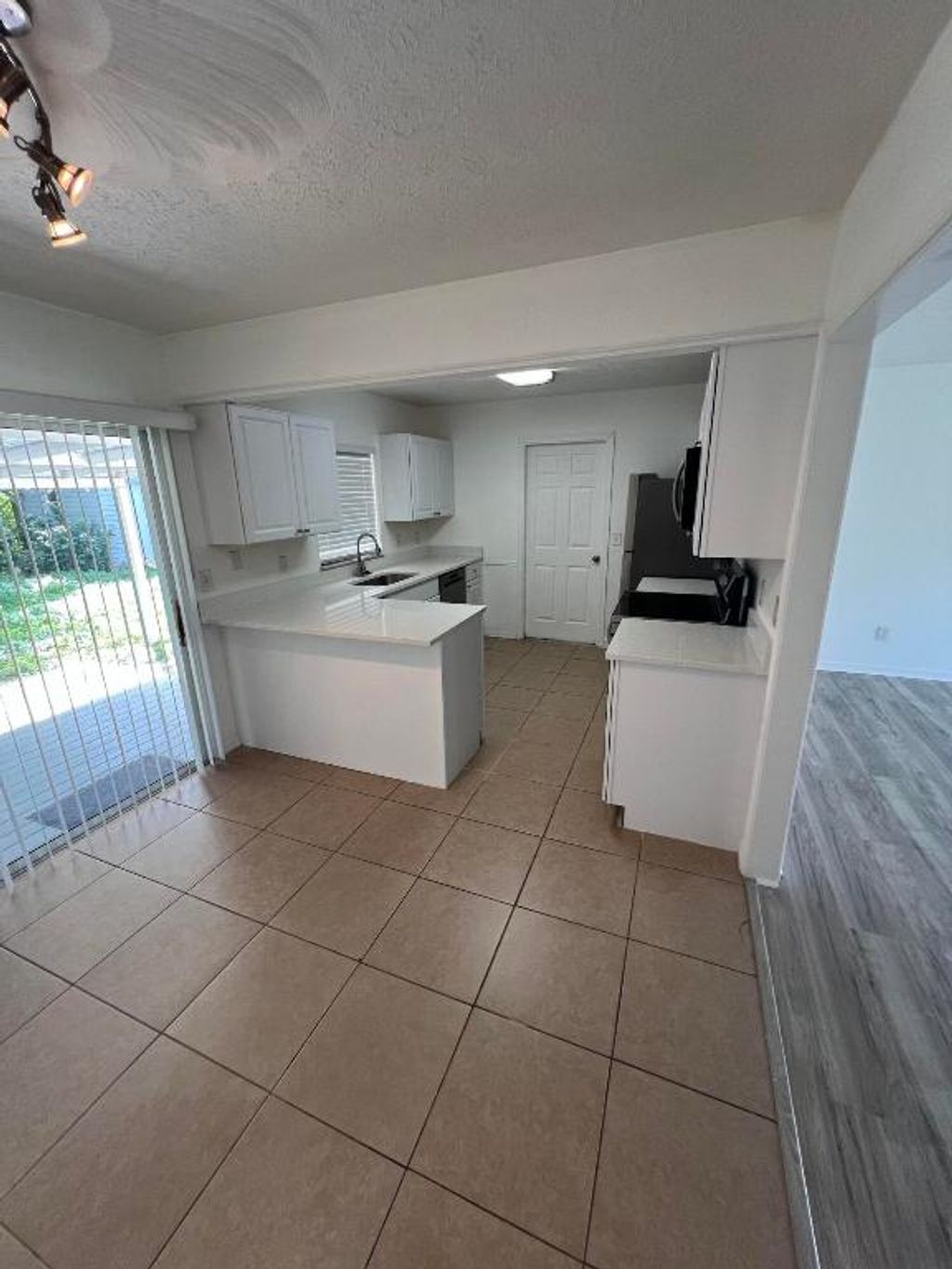 Photo of 2602 NE Myrtle Street, Jensen Beach, FL 34957 (MLS # R10956342)