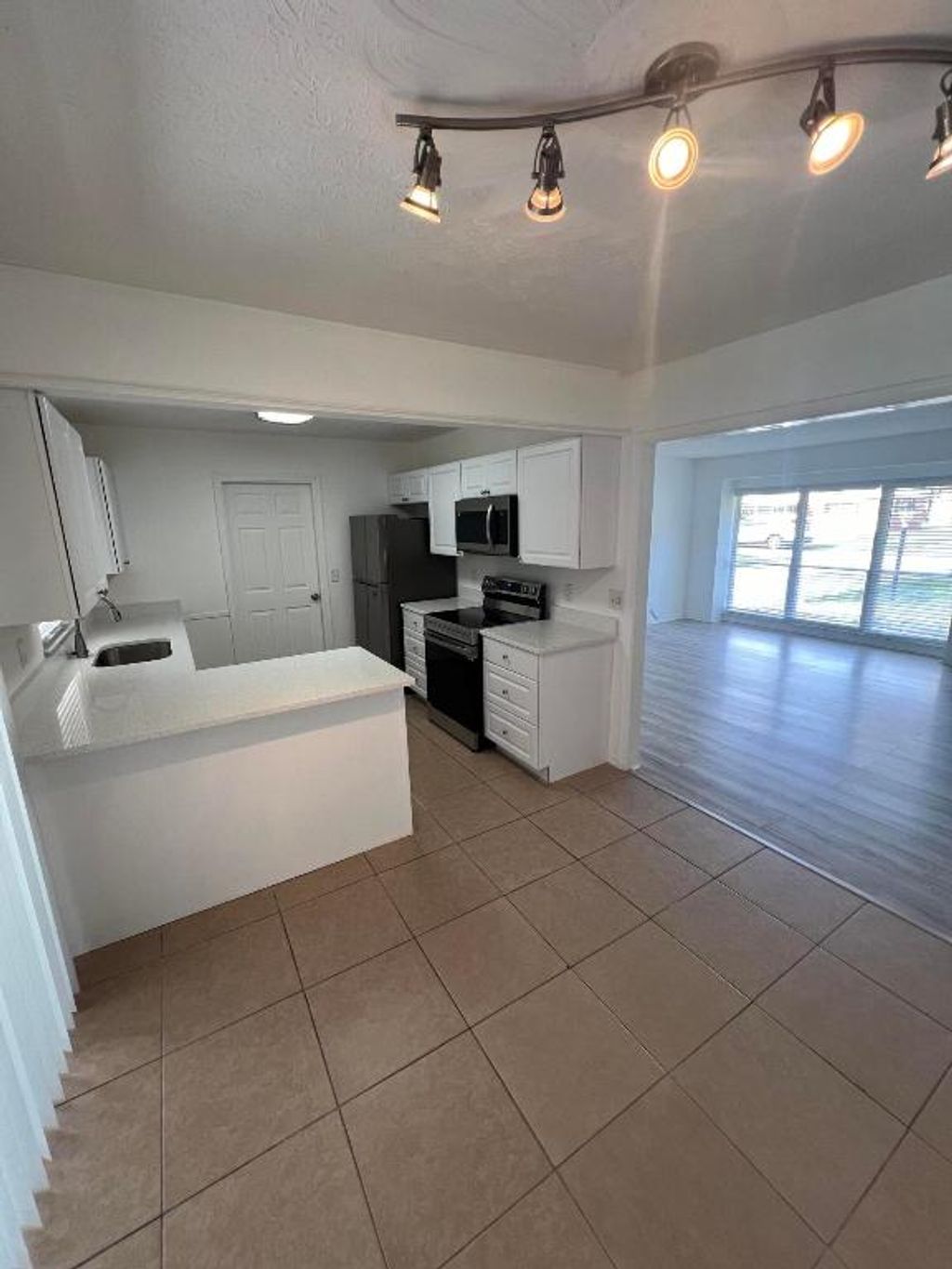 Photo of 2602 NE Myrtle Street, Jensen Beach, FL 34957 (MLS # R10956342)