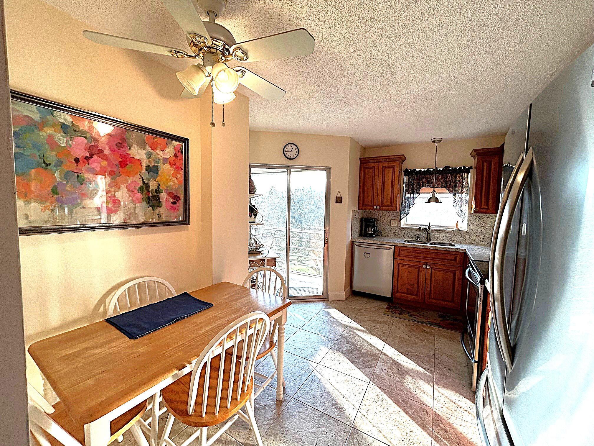 Beautiful Golf course view condo in the 55+ community of the Poinciana Country Club. Fully furnished/turnkey or unfurnished. Enjoy the view from the 25' long balcony or join the fun at the clubhouse singing Karaoke at Mels Bistro or dancing to the DJ. Many activities include a pay as you go 18 hole golf course, restaurant with entertainment, fitness center, billiards, 2 heated pools, ballroom and activities. This 2 bedroom 2 bath features a renovated kitchen with solid wood cabinetry, granite countertops and stainless steel appliances. Laundry inside. Master bedroom has ensuite bathroom with his and her closets including a walk in closet. Split bedroom floor plan and separate dining room. Close to the beach, medical and shopping.