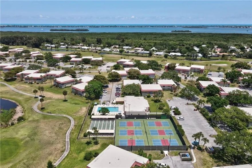 94 Spring Lake Dr #203 on the Mangrove Sands Golf Course in Vero Beach. This condo has a spacious layout with one bedroom and one and one-half bathrooms. The unit was updated a few years ago with new kitchen, bathrooms, flooring, electric, plumbing, drywall, and appliances. No popcorn on ceilings, Tile floors in kitchen, baths, and on glassed in porch. New 2025 high efficiency AC system. Furnished or unfurnished -same price. 4 pools, 4 clubhouses, tennis/pickleball courts, golf course and a restaurant/bar onsite. Very near shopping, and only 10 minutes to beaches. It's rented until 10/18/2026-lease will transfer to a buyer. Very nice upgraded Vista Royale condo at a non-upgraded price. .