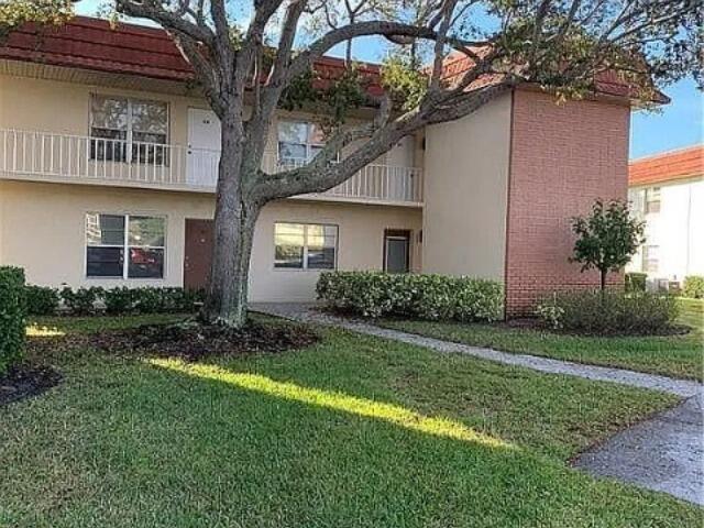 Your part or full time Florida place at 94 Spring Lake Dr #203 on the American Golf Course in Vero Beach. This condo offers a spacious layout with one bedroom and one and one-half bathrooms. The unit was updated a few years ago with new kitchen, bathrooms, flooring, electric, plumbing, drywall, and appliances. No popcorn ceiling asbestos or lead paint worries, Tile floors in kitchen, baths, and on glassed in porch. New 2025 high efficiency AC system. Furnished or unfurnished -same price. 4 pools, 4 clubhouses, tennis/pickleball courts, golf course and a restaurant/bar onsite. Very near shopping, and only 10 minutes to beaches. It's rented until 10/18/2025. Very nice upgraded Vista Royale condo at a non-upgraded unit price.