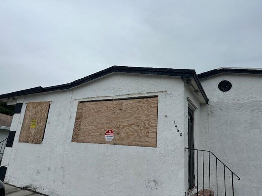 Photo of 1408 W 33rd Street, Riviera Beach, FL 33404 (MLS # R11005810)