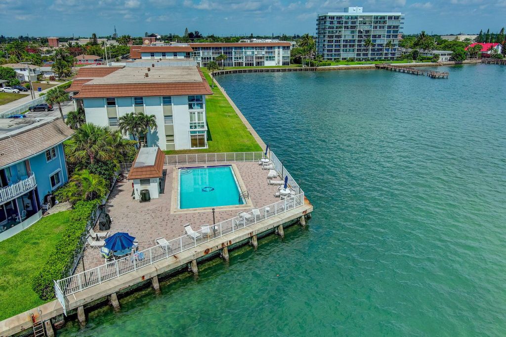 Photo of 2936 Lake Shore Drive #108, Riviera Beach, FL 33404 (MLS # R11129109)