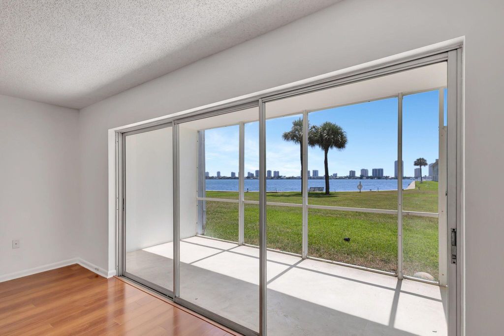 Photo of 2936 Lake Shore Drive #108, Riviera Beach, FL 33404 (MLS # R11129109)