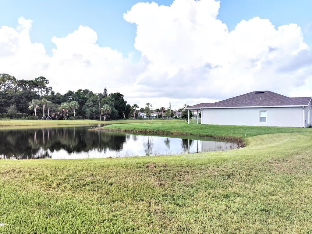 Photo of 201 Raspberry Road, Fort Pierce, FL 34981 (MLS # R11057740)