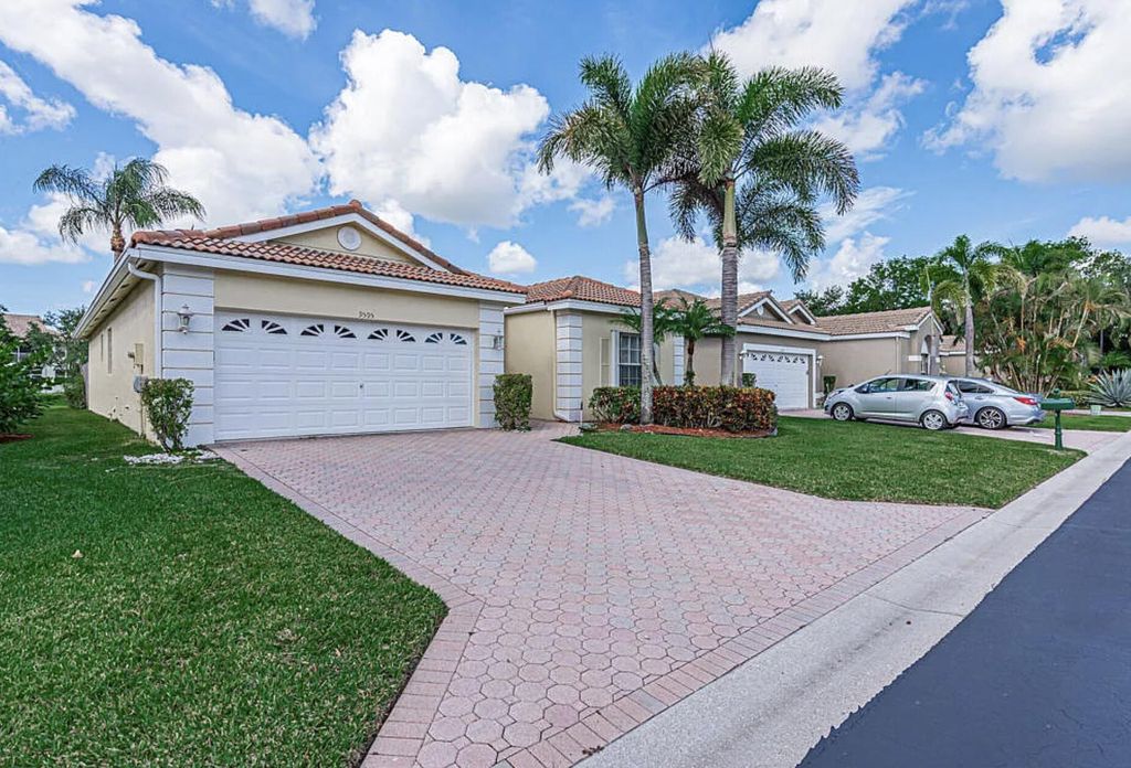 Photo of 9595 Orchid Grove Trail, Boynton Beach, FL 33437 (MLS # B26012985)