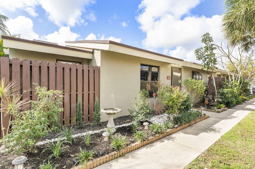 Welcome home to Willowbrook.  This 3 bedroom 2 bath townhouse shows extremely well. Offering a large screened in patio with access from the primary, guest and living room with outdoor TV for enjoyment and private entrance. Inside you will find 24x24 inch tile throughout, Vaulted ceilings offering added light and fresh paint.  Updated guest bathroom with quartz and frameless glass, large laundry room with extra storage, tankless water heater and newer electrical panel. W/D is app controlled and from 2023, new gutters.  Large master bedroom with vaulted ceilings and beautiful walk in closet with added built in shelving.  Complete Roof maintenance and replacement is included in the HOA, community offers a pool, parks, playgrounds, 2 tennis courts and 6 pickleball courts.  Located just off Congress you are minutes away from everything.  Murphy Bed in guest room and TV outside will convey.  Community is finance friendly with FHA and conventional loans as low as 5% down. Garden outside the main door with lighting and fountain.