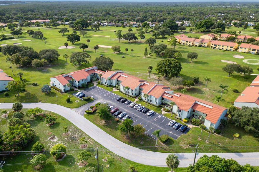 Enjoy peaceful views of the 14th fairway at Miles Grant Golf Course right from your living room or sun-filled bonus room. This home has been thoughtfully updated where it matters most: beautiful new tile flooring in the living areas and kitchen, brand-new appliances (including washer and dryer), and fresh cabinetry with quartz countertops in both kitchen and baths. The air conditioner was replaced in 2017, and you'll appreciate the ample storage with multiple closets throughout. A bonus room off the primary bedroom makes an ideal study, hobby space, or quiet reading nook.
For peace of mind, every window has hurricane protection with impact glass, many also  have  accordion shutters in addition.
Living at Miles Grant Country Club means more than just a home—it's a lifestyle. 
See More. A required social membership ensures access to an active community offering golf, pickleball, tennis, swimming, monthly social activities and more.  You'll also enjoy the club's dining room and tavern, known for excellent means, with only a modest $350 annual dining minimum.  This is an ideal opportunity to embrace a worry-free, active, and welcoming community