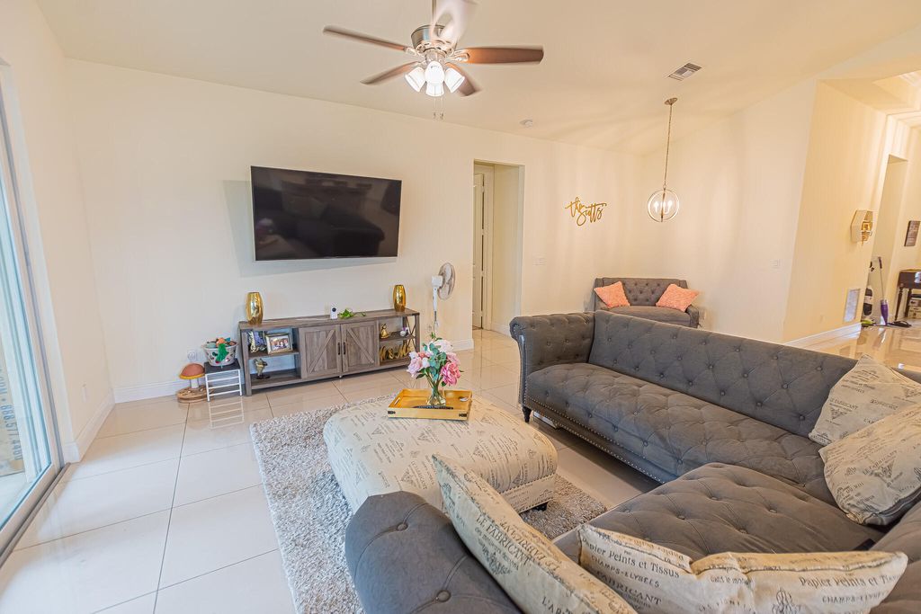 Photo of 930 SW Versailles Avenue, Port Saint Lucie, FL 34953 (MLS # B26011678)