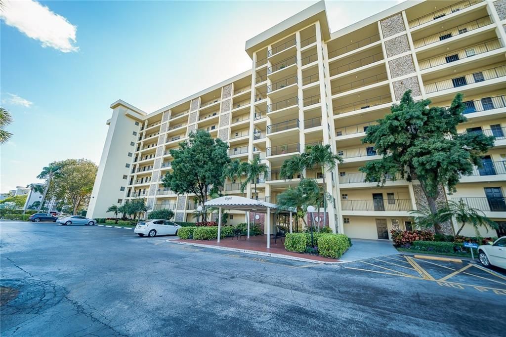 Photo of 3050 N Palm Aire Dr #401, Pompano Beach, FL 33069 (MLS # F10269880)