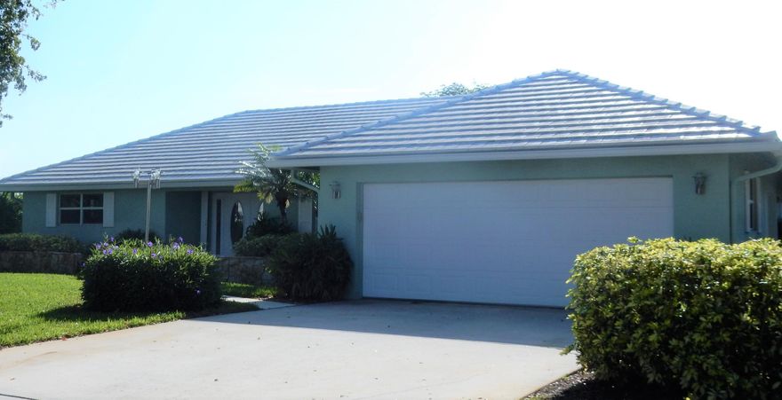 This is a lovely 3 bedroom 2 bath home with a spectacular view of North Lake.  You have a beautiful view from almost every room in this home.  This home is an open floor plan with split bedrooms, a formal dining room and an eat in Kitchen.  The roof was replaced in 2005.  A/C were replaced in 2013.The kitchen has a wonderful cooks island.  The kitchen opens to a wonderful family room. Your kitchen has a pass through to your heated pool, and grand patio. You have a spacious family room as well.  This split bedroom home hosts a master with 3 closets, dual sinks and a cabana bath.  This home has complete Hurricane Protection. All windows are impact except for the kitchen pass through That window has panels.  The sliders have accordion shutters.  You are completely hurricane safe in this home. Delray Dunes has a brand new golf course, redone last summer.Clubhouse is 5 years young with amenities galore. This is close to airports, beaches, restaurants, and most importantly the beach.