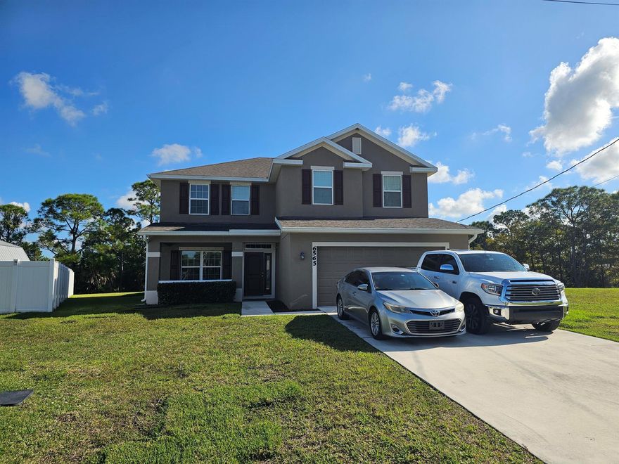 PRIME LOCATION! NO HOA! Experience the ultimate Port St. Lucie lifestyle in this spacious 5-bed, 3.5-bath, 2700 sq ft home on a quiet cul-de-sac. Enjoy unparalleled convenience: walking distance to St. James Golf Course and under 5 minutes to Publix. Commuters will love the instant access to I-95, the Turnpike, and U.S. 1.The two-story layout features a main-level master suite and open-concept kitchen with stainless steel appliances and upgraded flooring. Upstairs, find 4 bedrooms, 2 full baths (including a Jack & Jill), and a huge bonus room perfect for entertaining. Sitting on .24 acres, the property offers a large driveway, a desirable back porch, and a semi-private preserve view with ample space to add a pool. Peace of mind is assured with a 7-year-old roof and superb maintenan