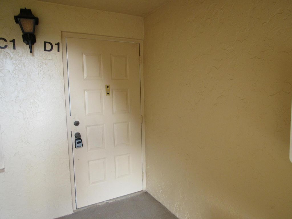 Photo of 814 Sky Pine Way #D1, Greenacres, FL 33415 (MLS # R11038226)