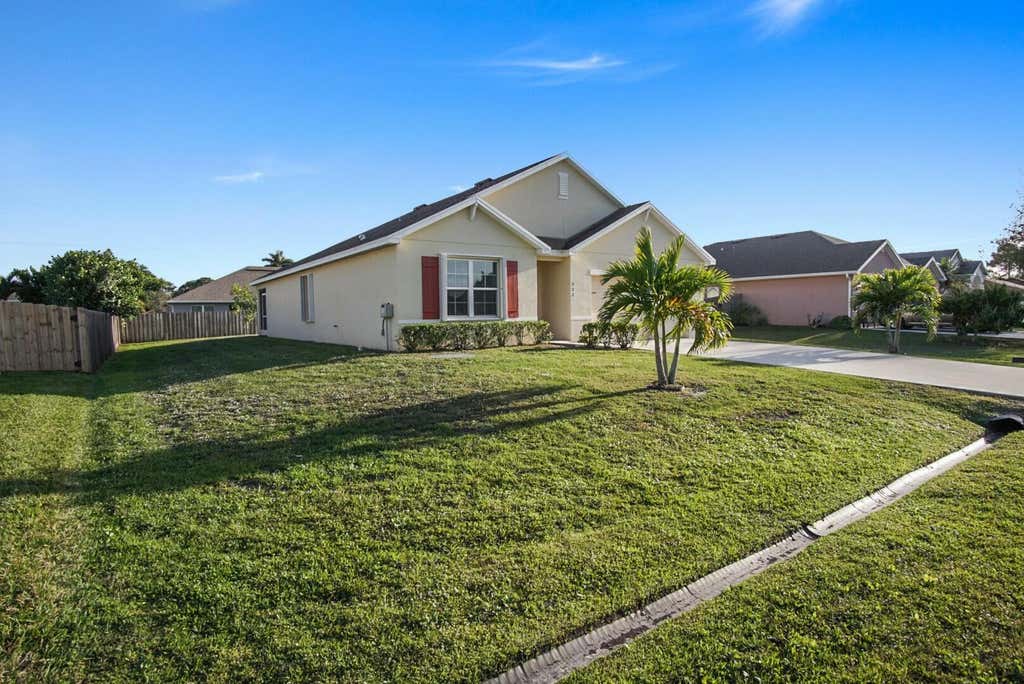 Photo of 322 SW Molloy Street, Port Saint Lucie, FL 34953 (MLS # R11063608)