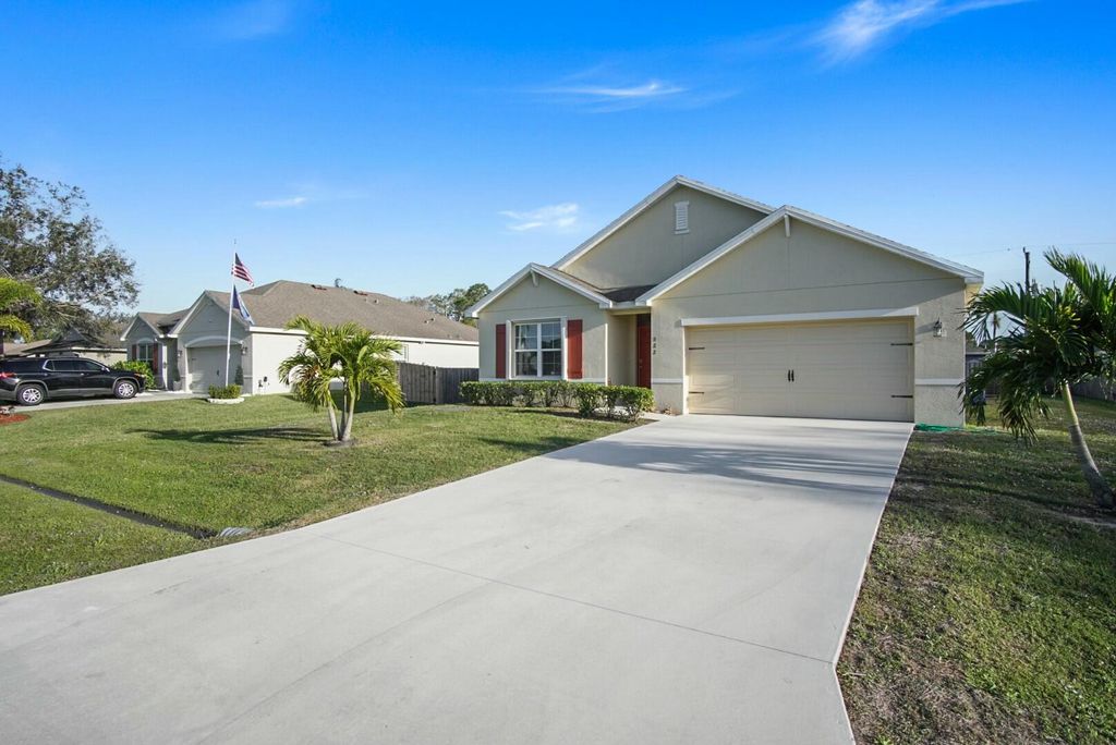 Photo of 322 SW Molloy Street, Port Saint Lucie, FL 34953 (MLS # R11063608)
