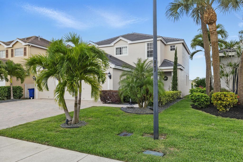 Photo of 125 Kensington Way, Royal Palm Beach, FL 33414 (MLS # R11079157)