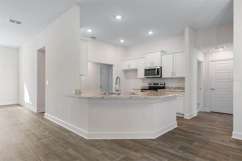 Photo of 781 NE Lanfair Street, Port Saint Lucie, FL 34983 (MLS # B26010333)