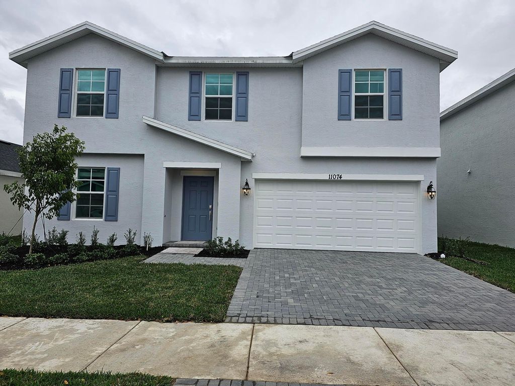 Photo of 11074 Pondside Lane, Port Saint Lucie, FL 34987 (MLS # B26007536)