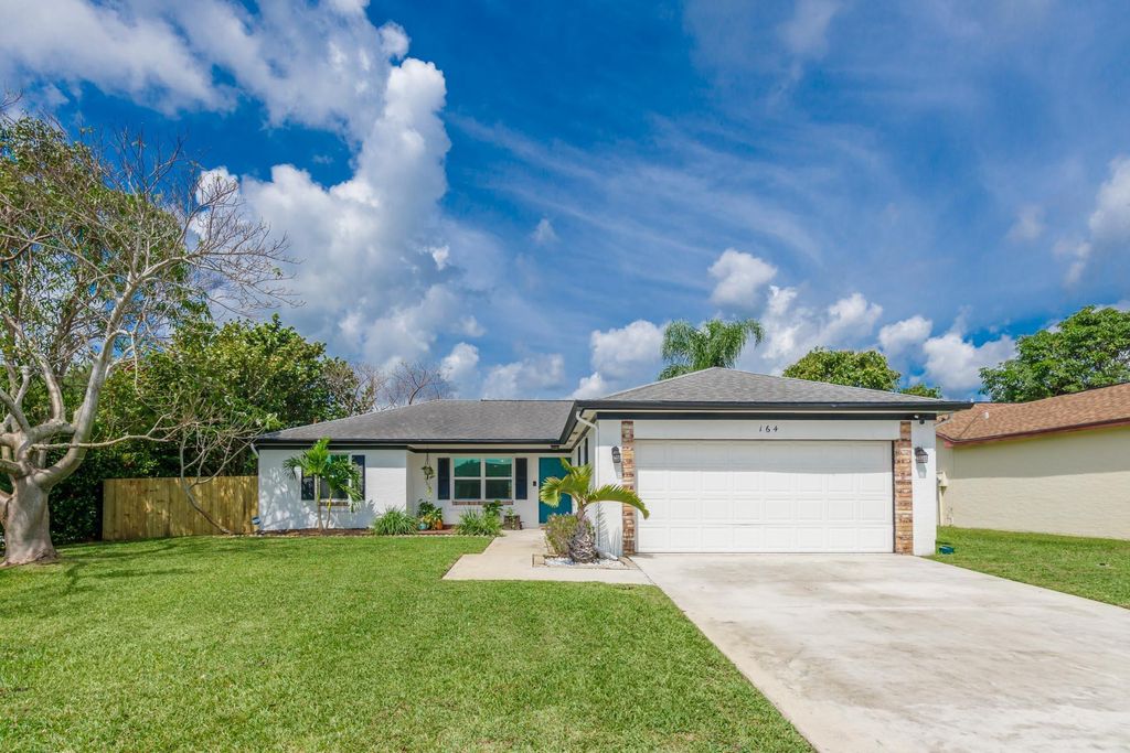 Photo of 164 Arrowhead Circle, Jupiter, FL 33458 (MLS # R10970377)