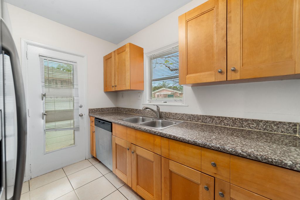 Photo of 719 Valley Forge Road, West Palm Beach, FL 33405 (MLS # R11154906)