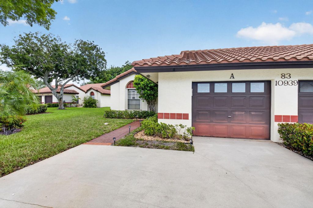 Photo of 10939 Roebelini Palm Court #A, Boynton Beach, FL 33437 (MLS # B26033560)