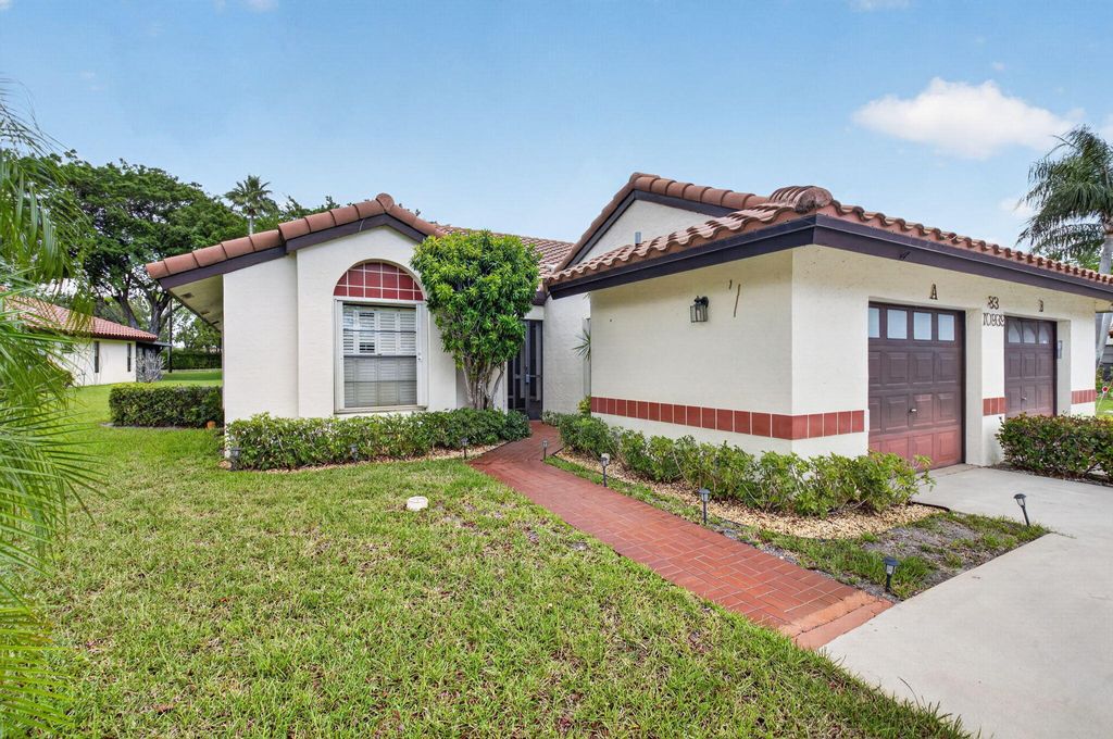Photo of 10939 Roebelini Palm Court #A, Boynton Beach, FL 33437 (MLS # B26033560)