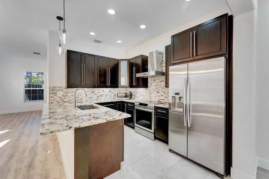 Photo of 406 NW 25th Avenue, Boynton Beach, FL 33426 (MLS # R11161233)