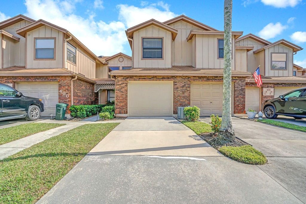 Photo of 400 Crosswinds Drive #D2, Greenacres, FL 33413 (MLS # R10946841)