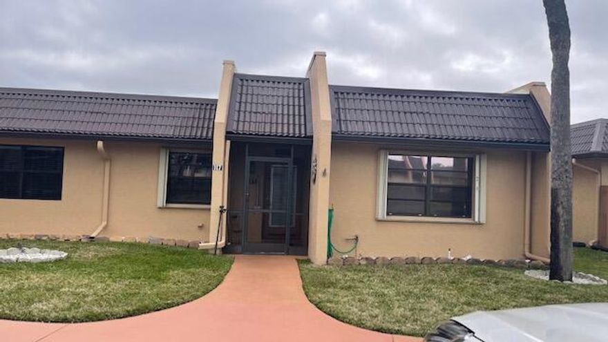 This unit is a 2/2 corner unit with a formal dining room and eat in kitchen. The bedrooms are split and the porch is enclosed. The owner is in the process of building a home and the family is packing so please excuse the boxes. This unit is centrally located close to the phase B clubhouse and tennis courts and the street has its own satellite pool. There are pets on the property and requires an appointment with 1 hour notice for showing. Close to shopping, highways, outlet malls, and beaches not to forget the airport.